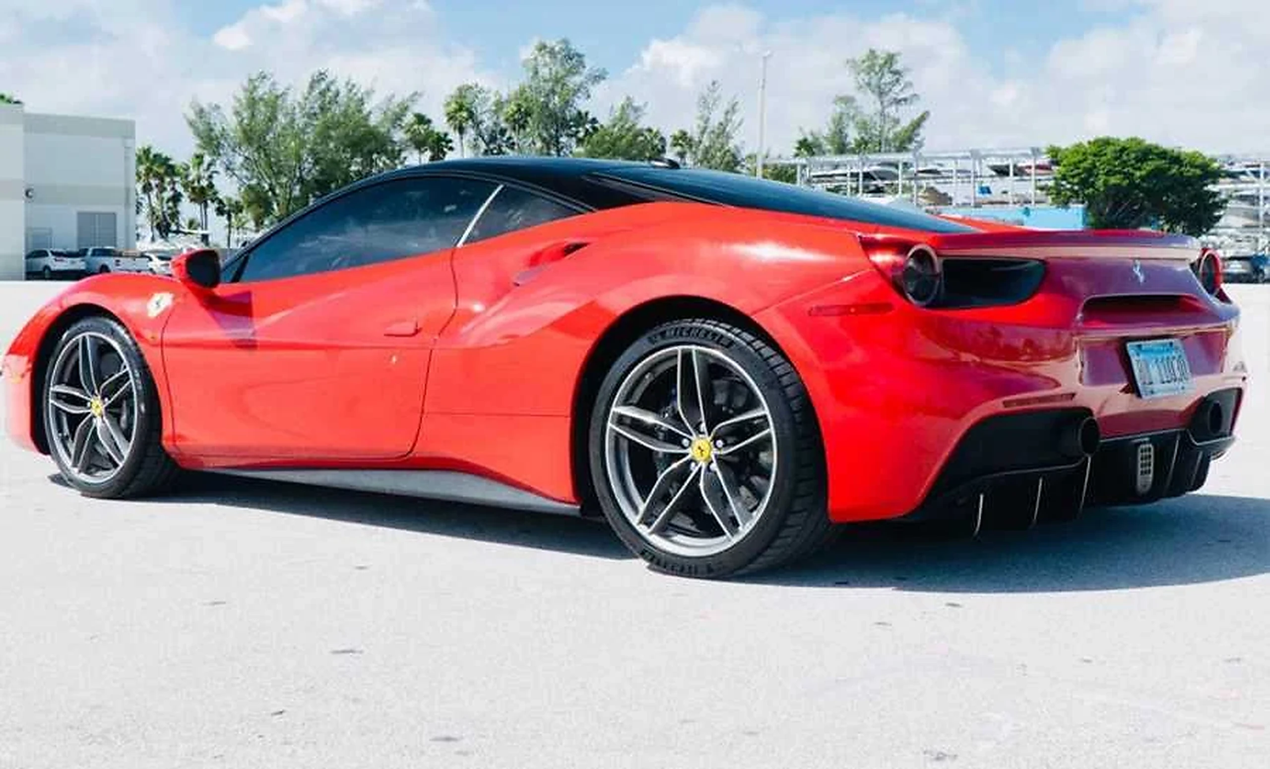 Ferrari 488 GTB detail relevant to multi-car exotic rental coordination on LUXURY.CAFE