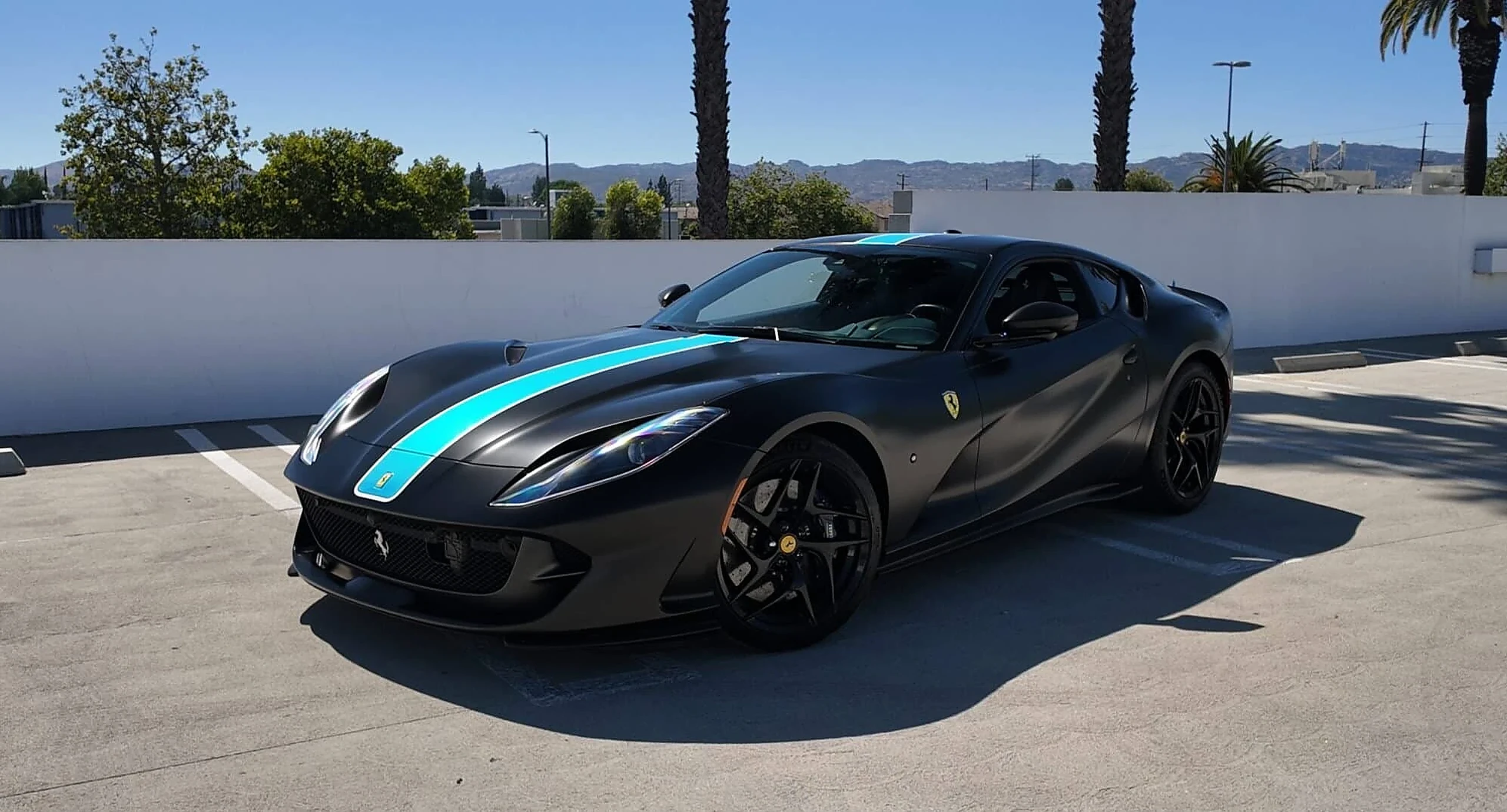 Ferrari 812 Superfast detail relevant to v12 exotic car rentals on LUXURY.CAFE